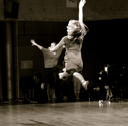 two dancers jumping